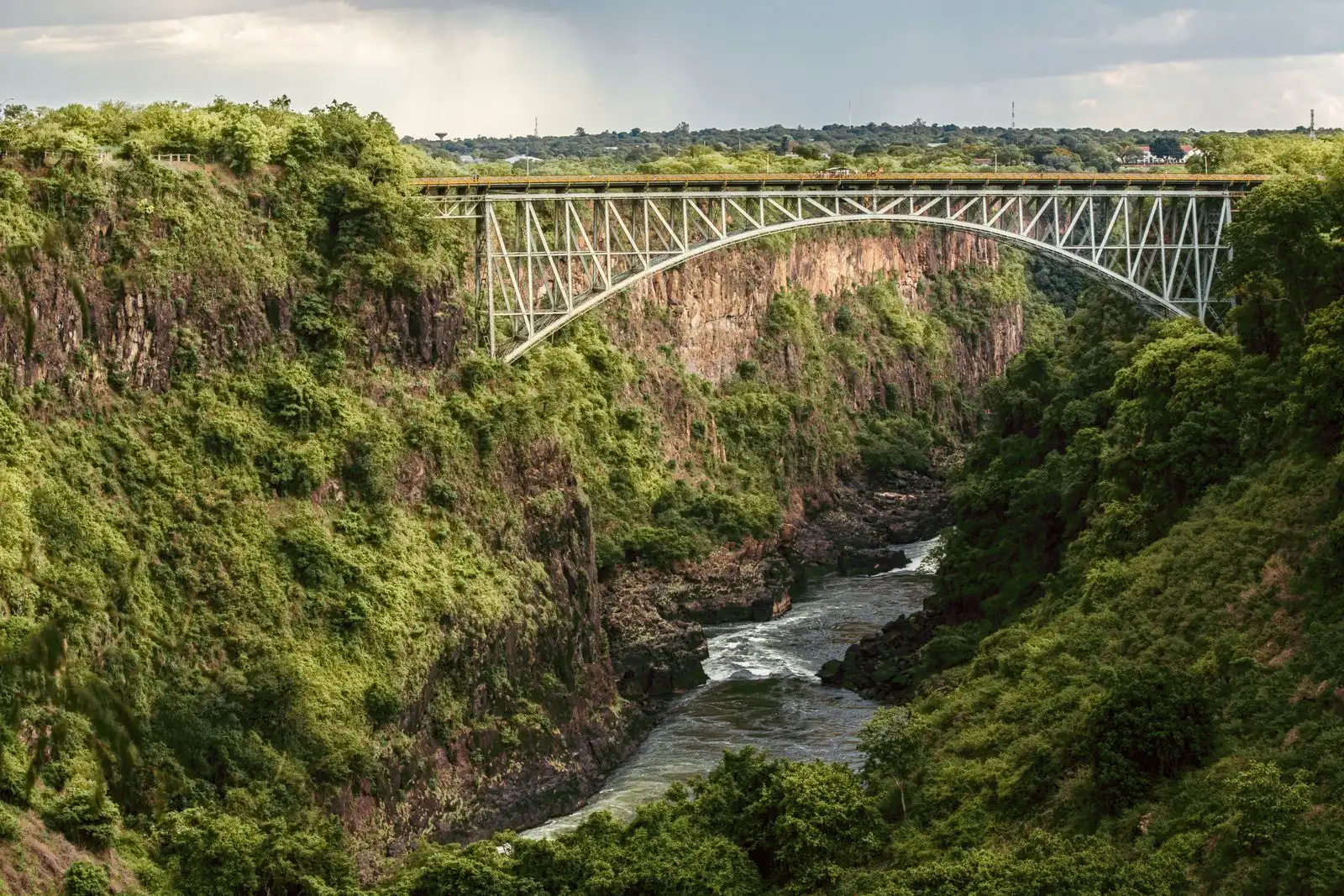 Victoria Falls Bridge spanning the green gorge above the Zambezi
