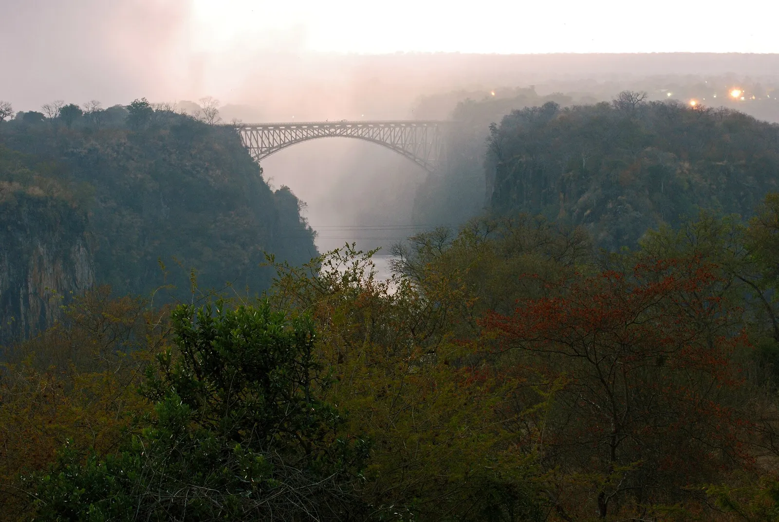 Victoria Falls Bridge in morning haze, seen from the Zimbabwe side